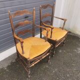 Pair of blackened wooden armchairs