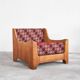 Sculptural lounge chair in solid oak from the 1940s.