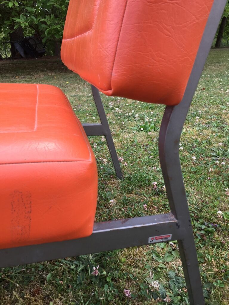 Henri Julien 70s orange chair