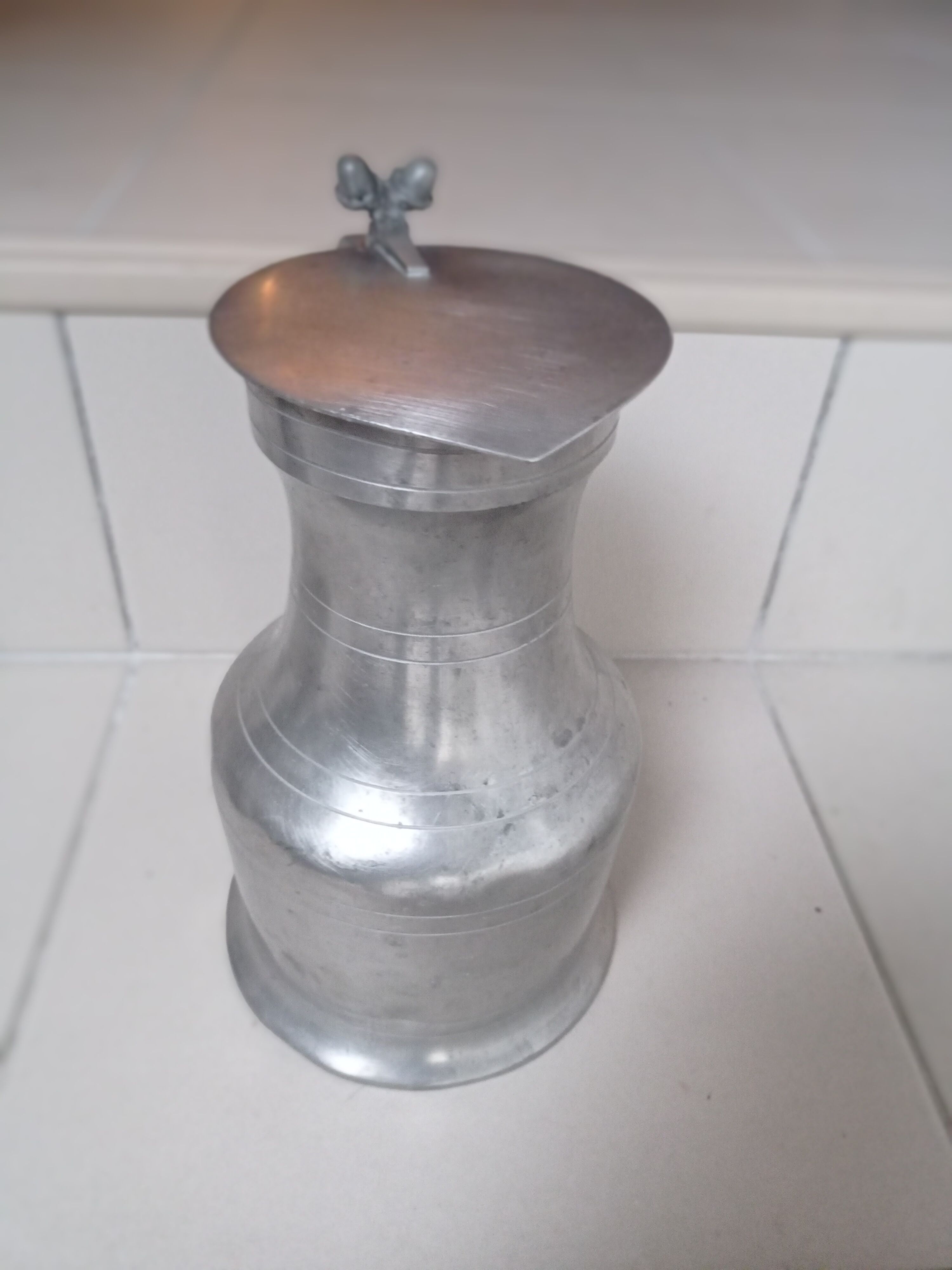 Tin pitcher