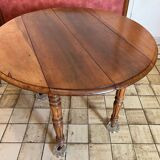 Folding round wooden table
