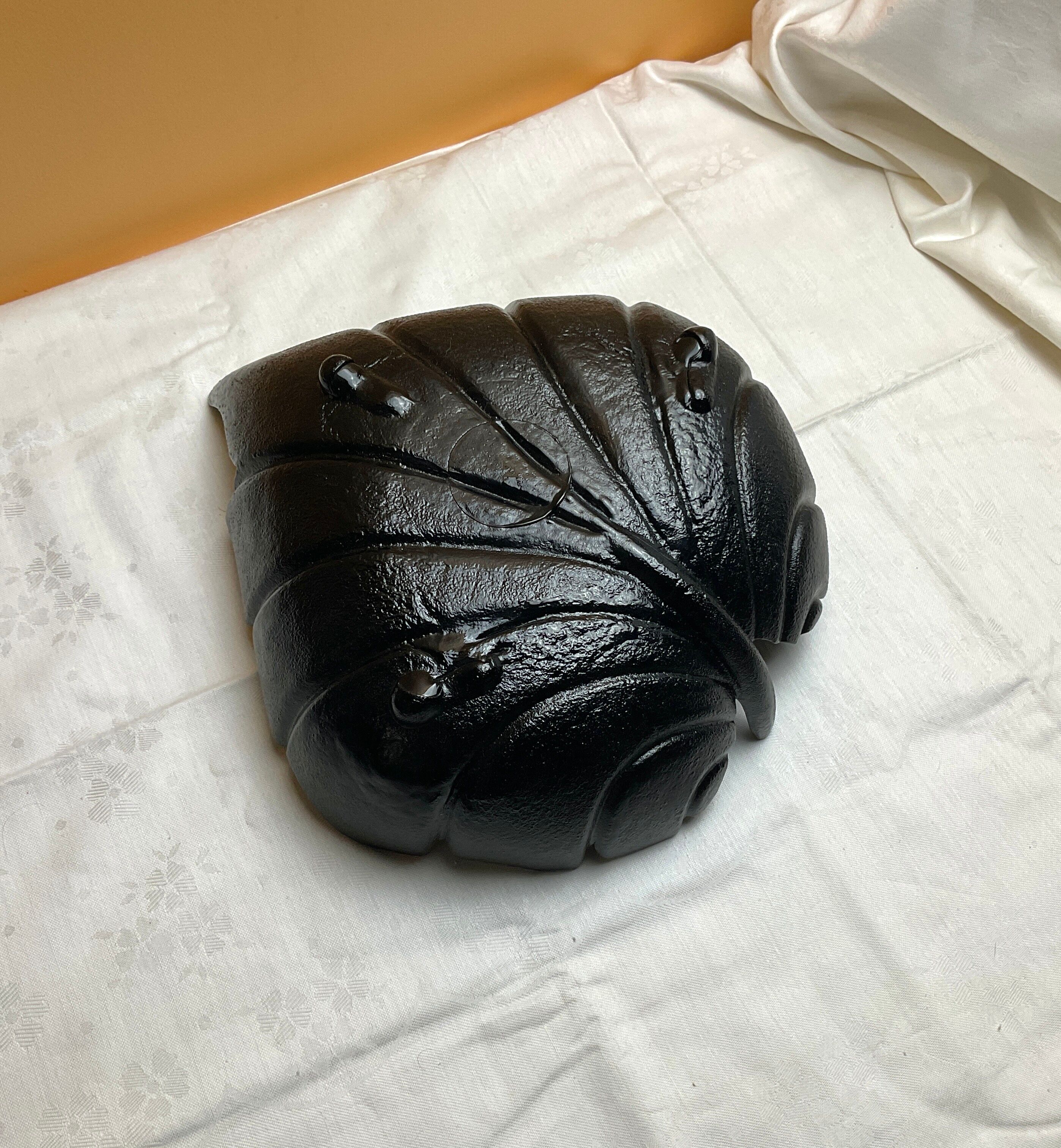 Black glass sheet shaped tidy