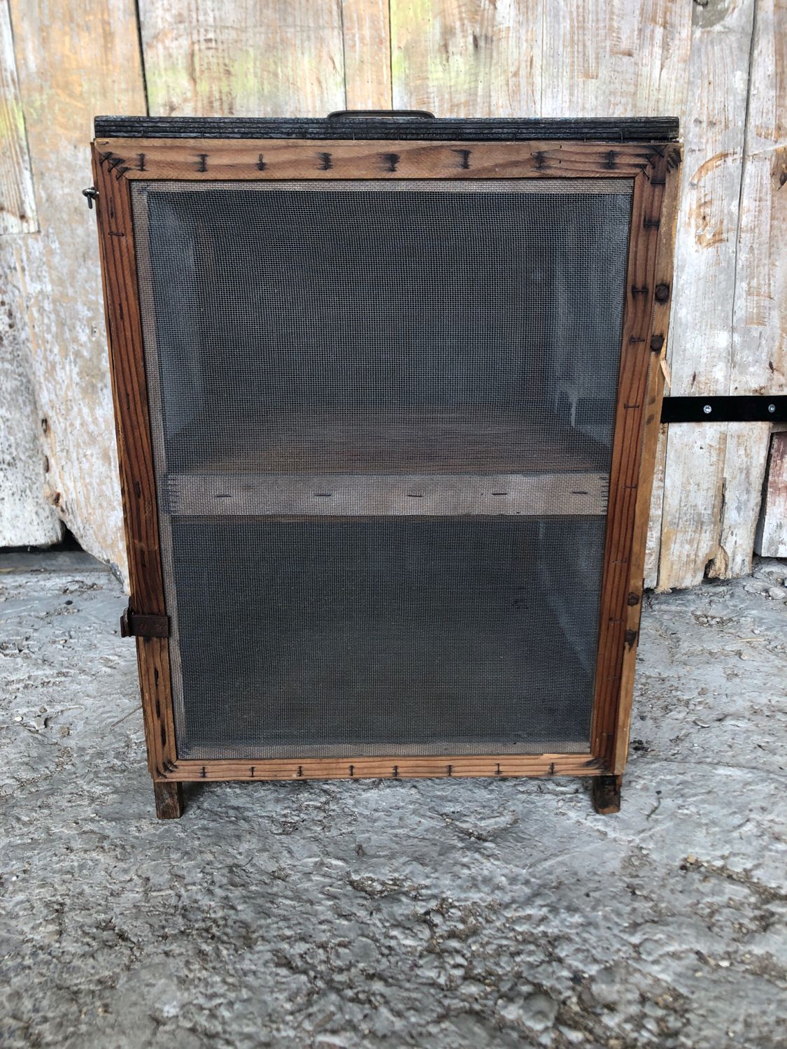Old wooden pantry cabinet and mesh & vintage metal handle