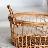 Round openwork wicker storage basket with braided handles