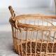 Round openwork wicker storage basket with braided handles
