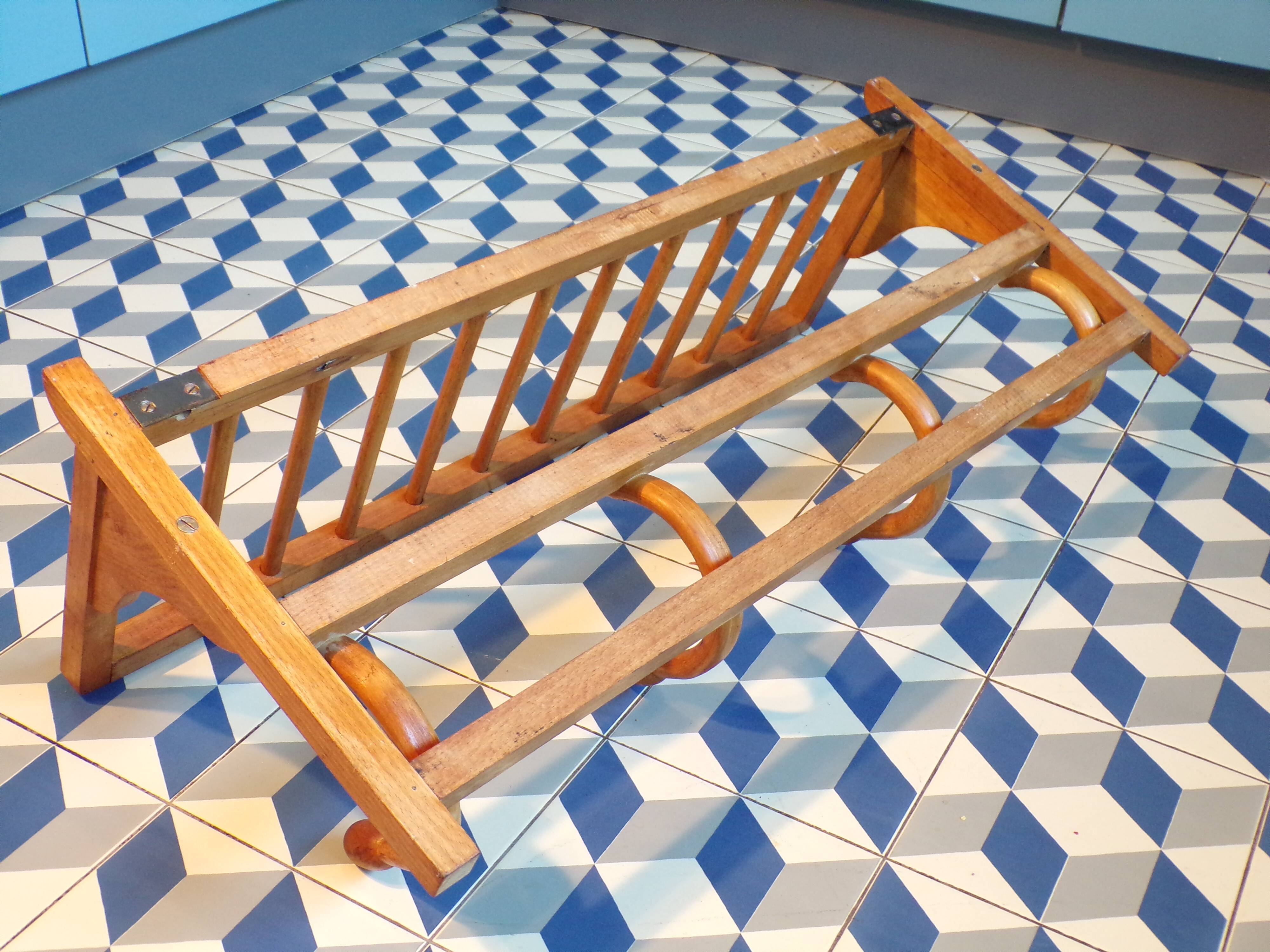 Curved wooden coat rack with shelf