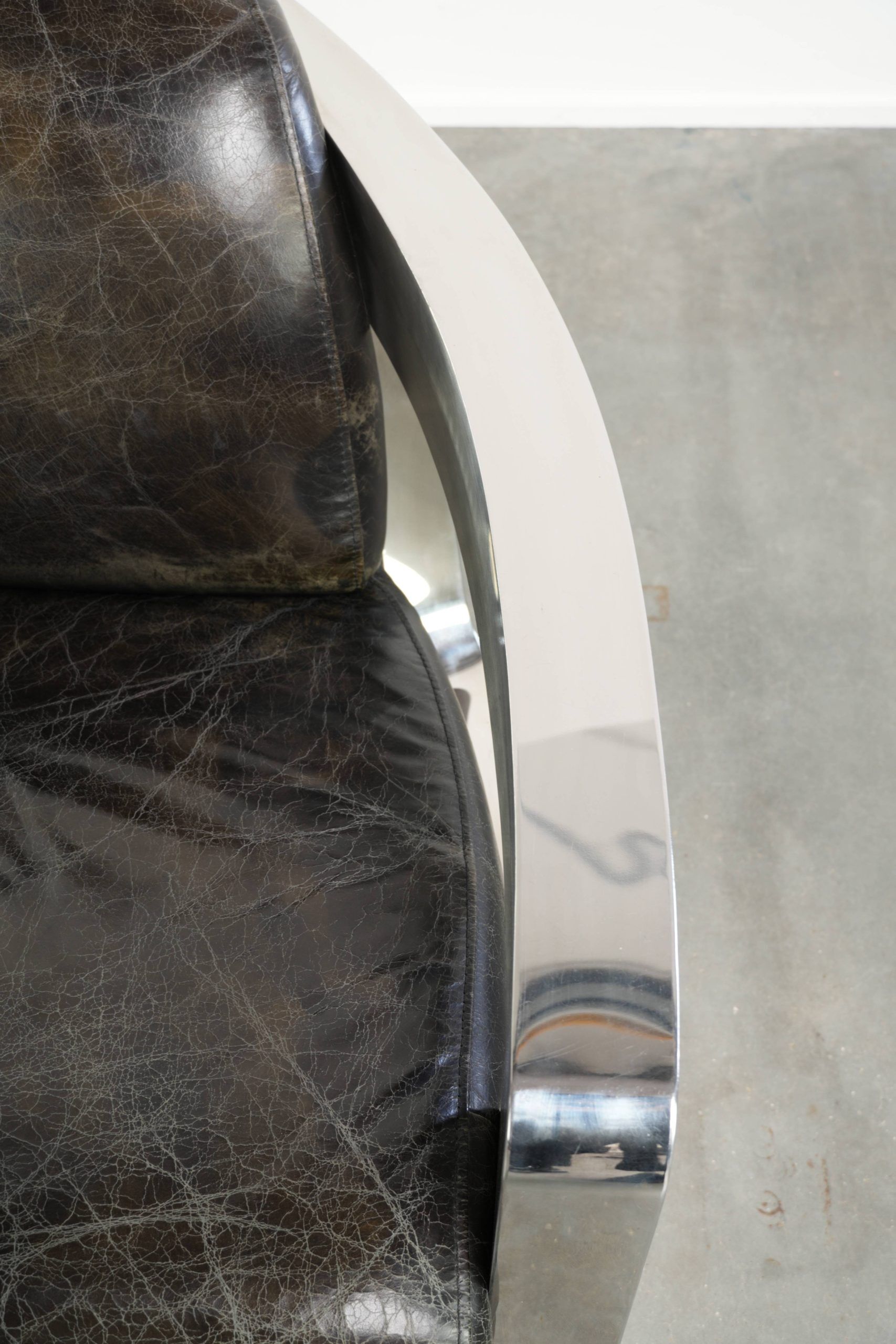 Industrial Aviator design armchair in cowhide finished with aluminium