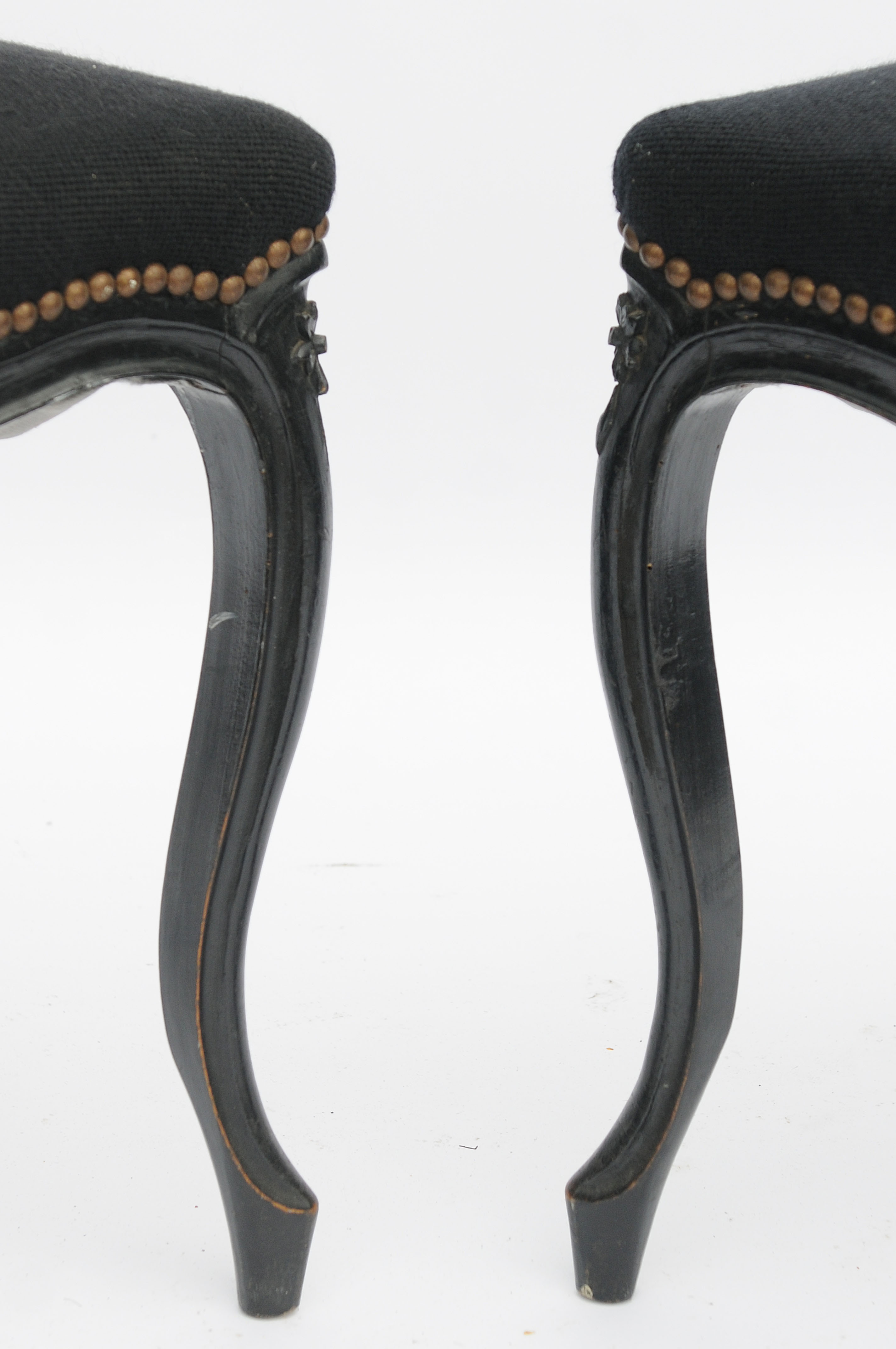 Pair of black Louis XV-style chairs