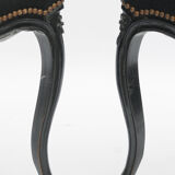 Pair of black Louis XV-style chairs