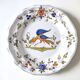 Moustiers earthenware decorative plate with bird