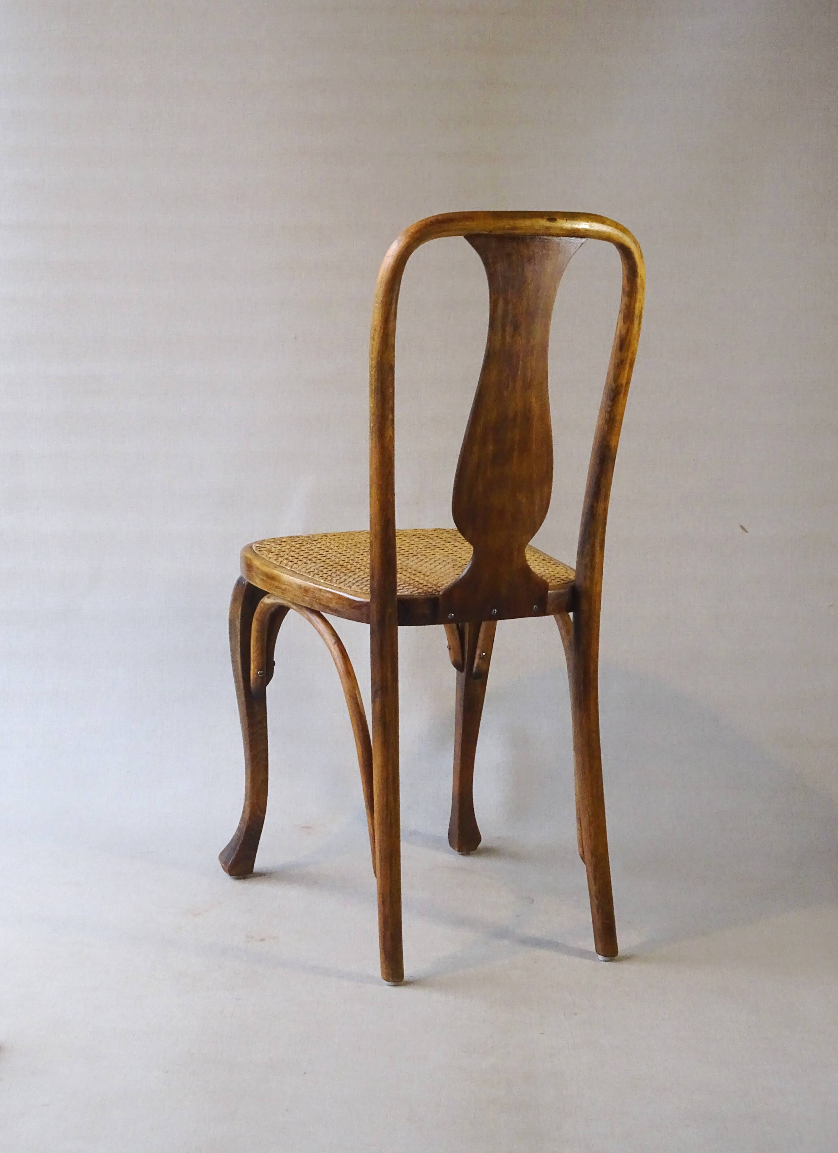 Two Kohn chairs, No. 529, circa 1910, bistro style, caned, bentwood