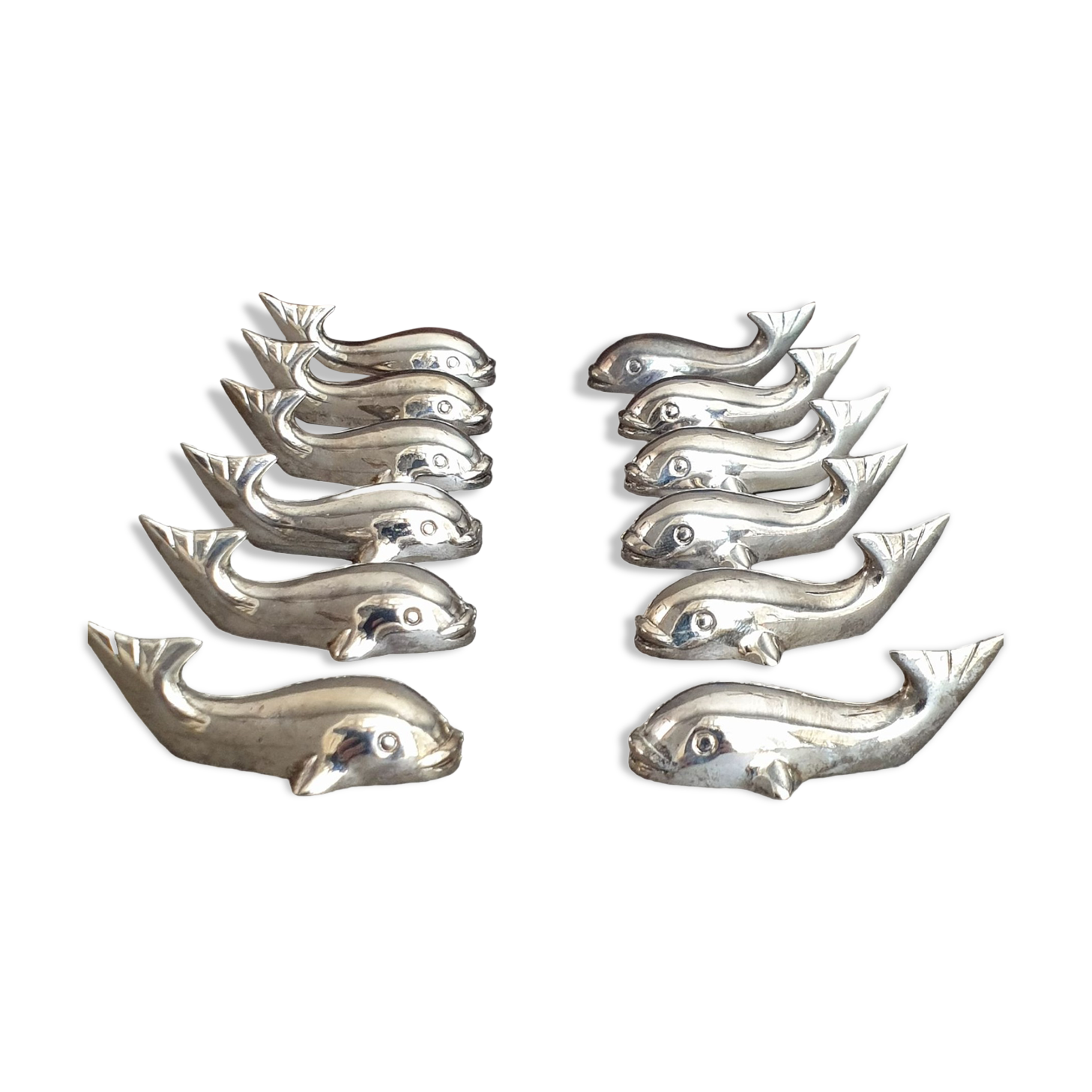 Lot 12 porte-couteaux en forme de baleine ou poisson stylisé