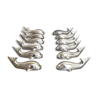 Lot 12 porte-couteaux en forme de baleine ou poisson stylisé