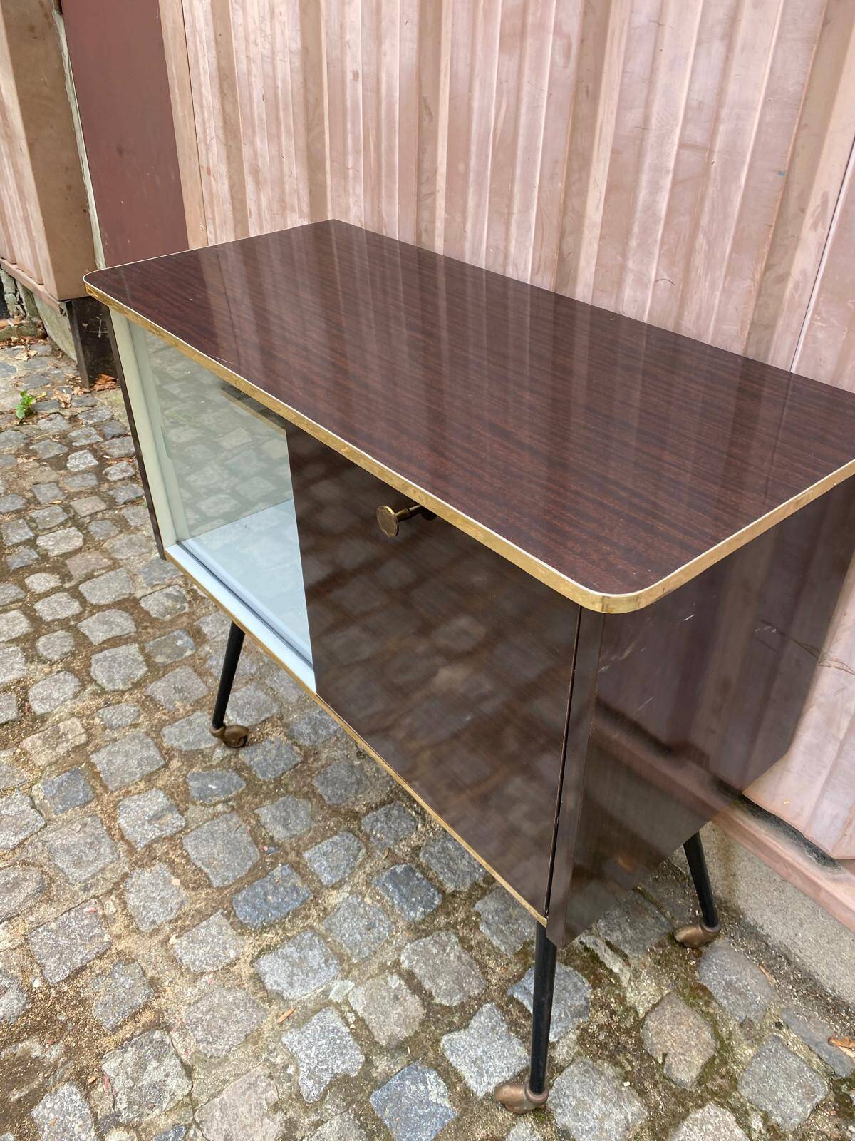 Mid-Century Modern bar cabinet 1960s with compass legs & brass