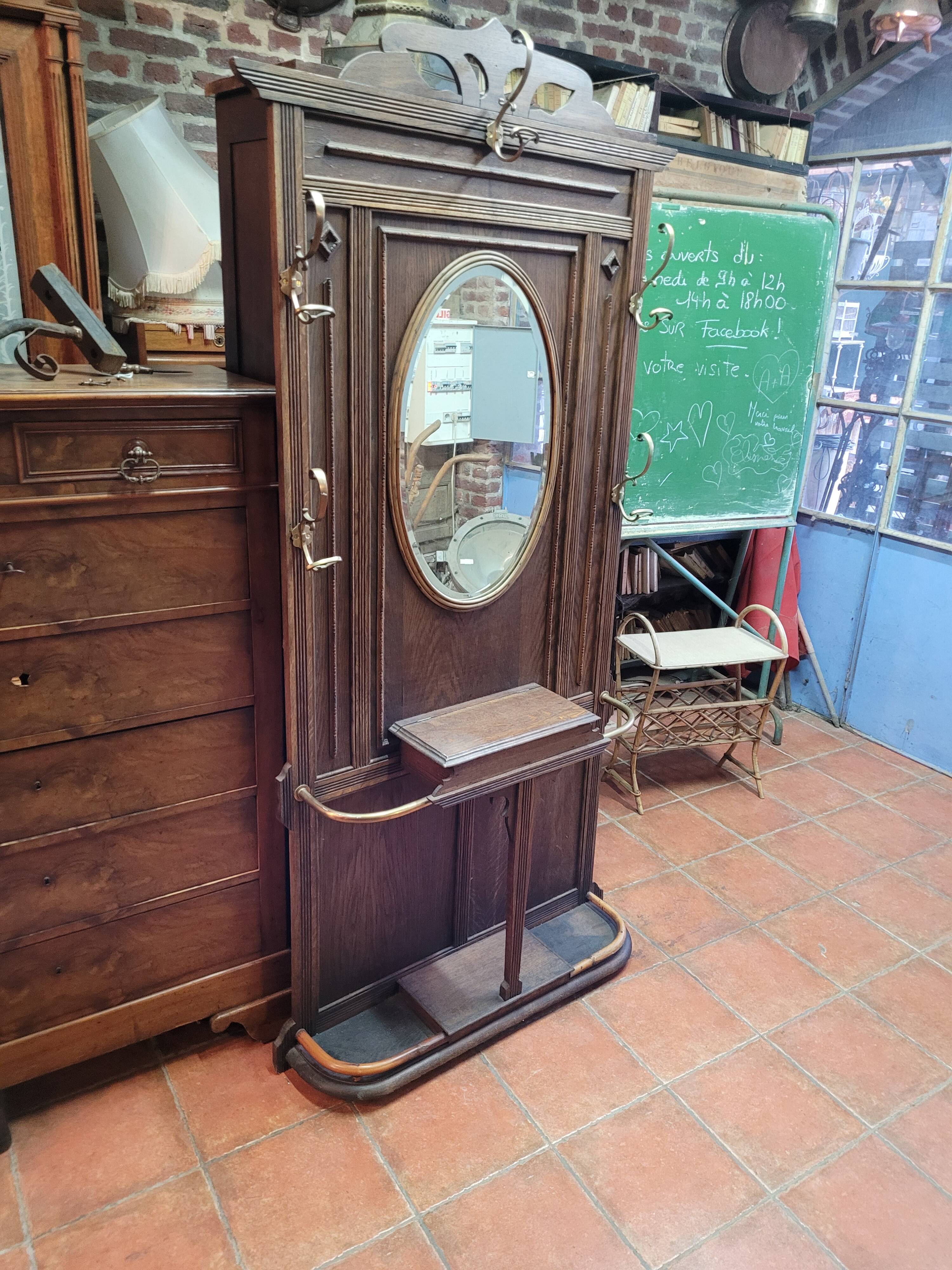 Old cloakroom or coat rack in oak
