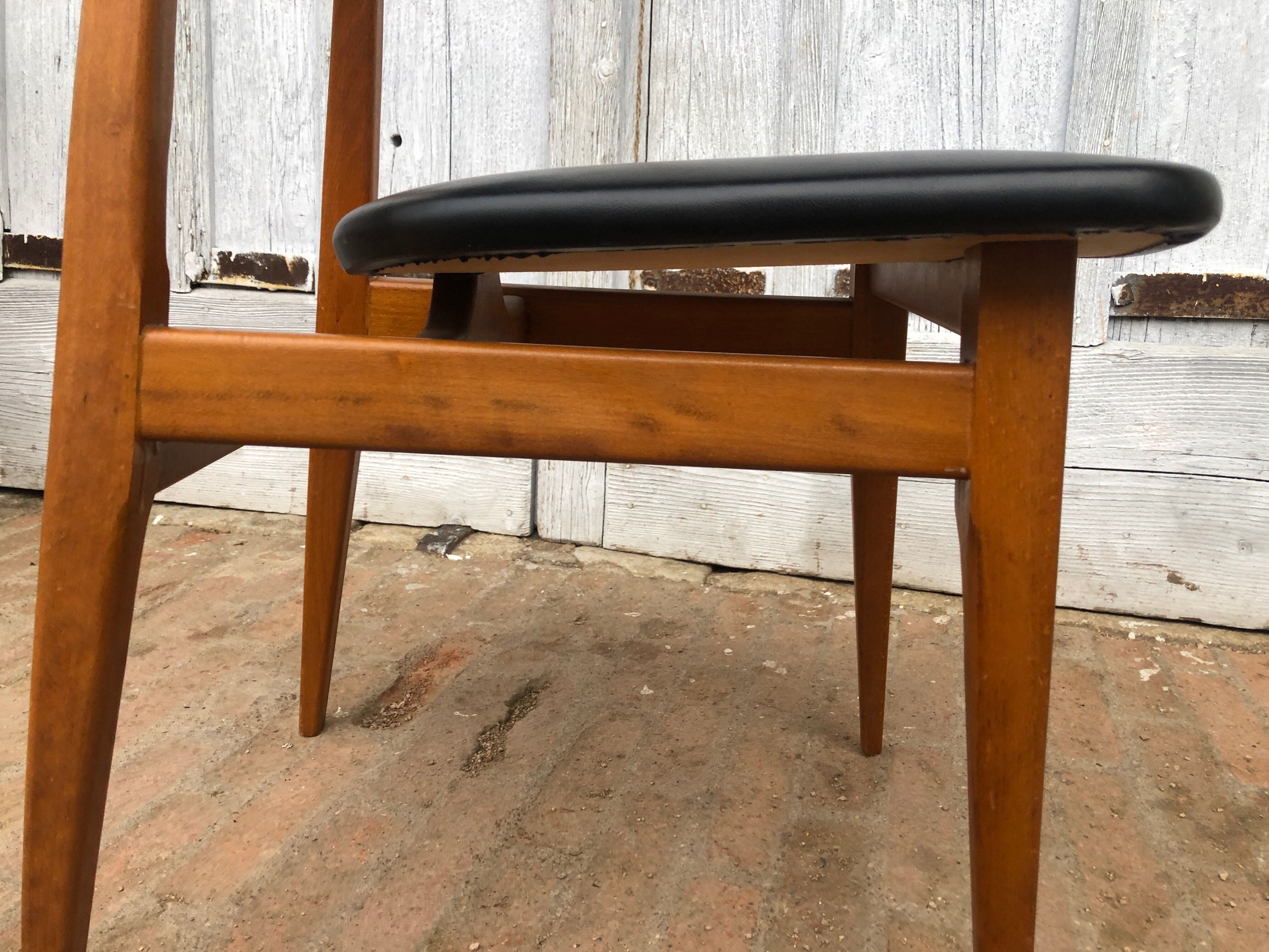 Set of 4 Scandinavian teak and black skai chairs
