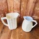 A pair of vintage ceramic jugs from the 1950s.