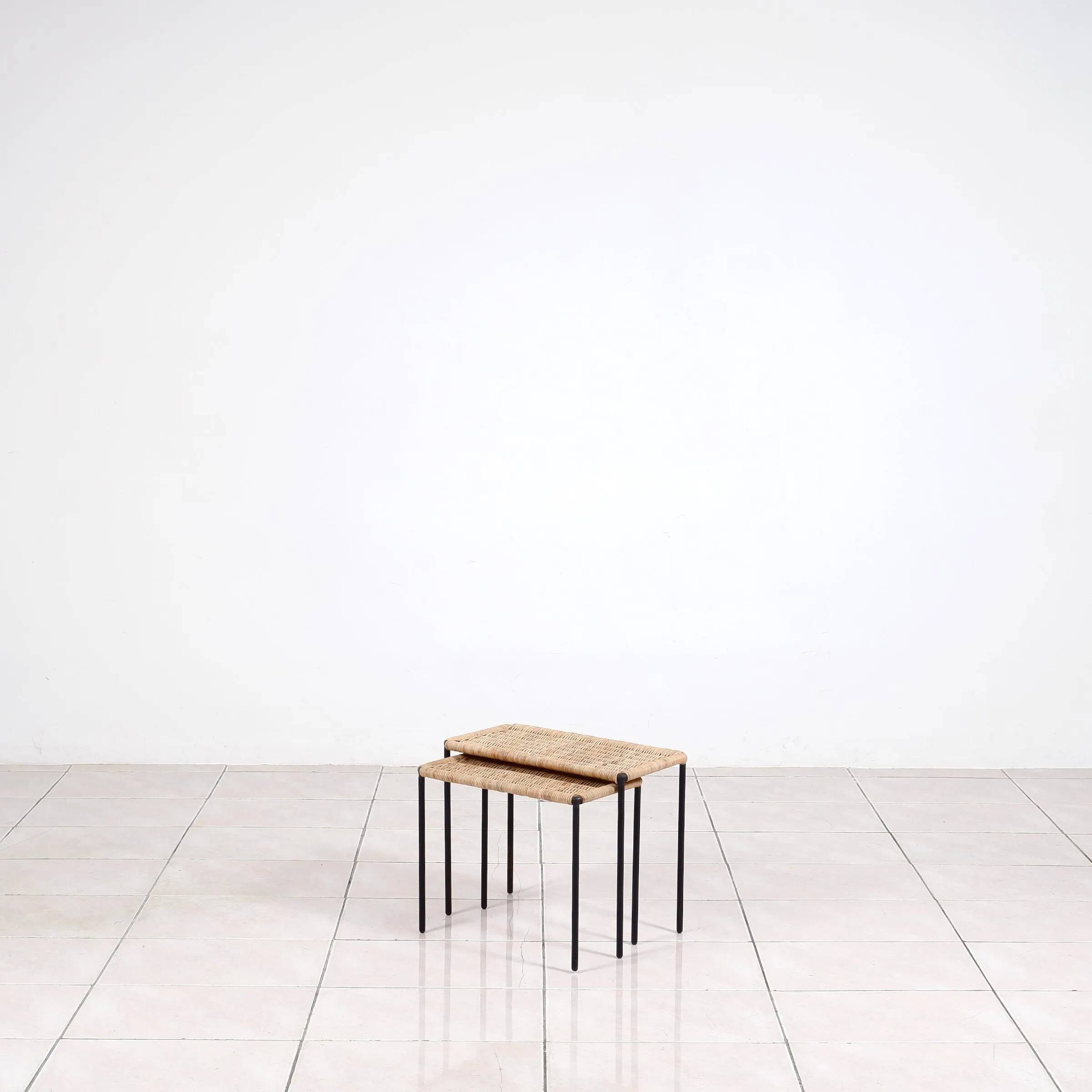 Nesting tables in metal / rattan by Carl Auböck