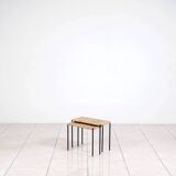 Nesting tables in metal / rattan by Carl Auböck