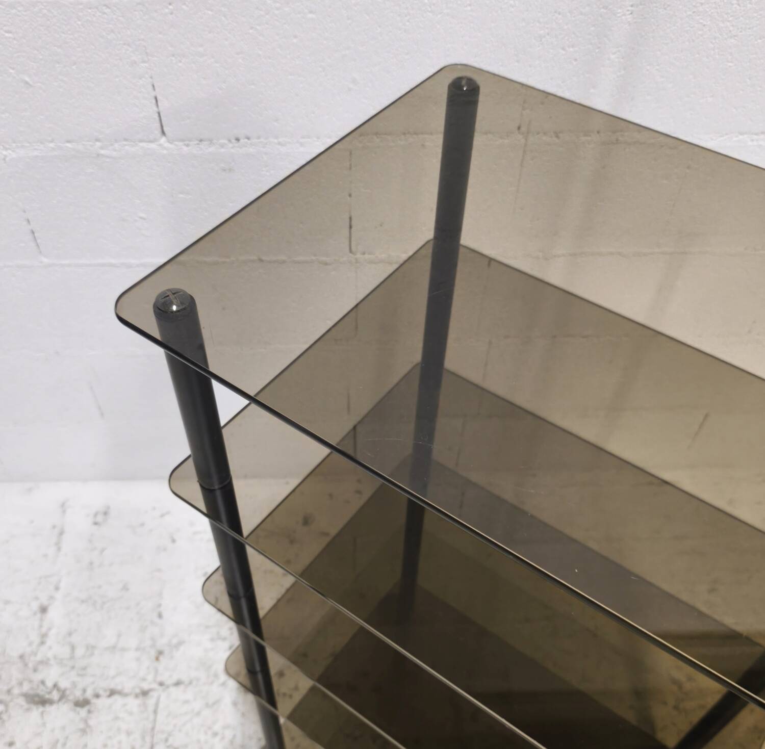 Smoked glass shelving unit, 1980