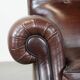 Fauteuil anglais ancien en cuir de mouton