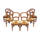 6 rustic straw chairs.