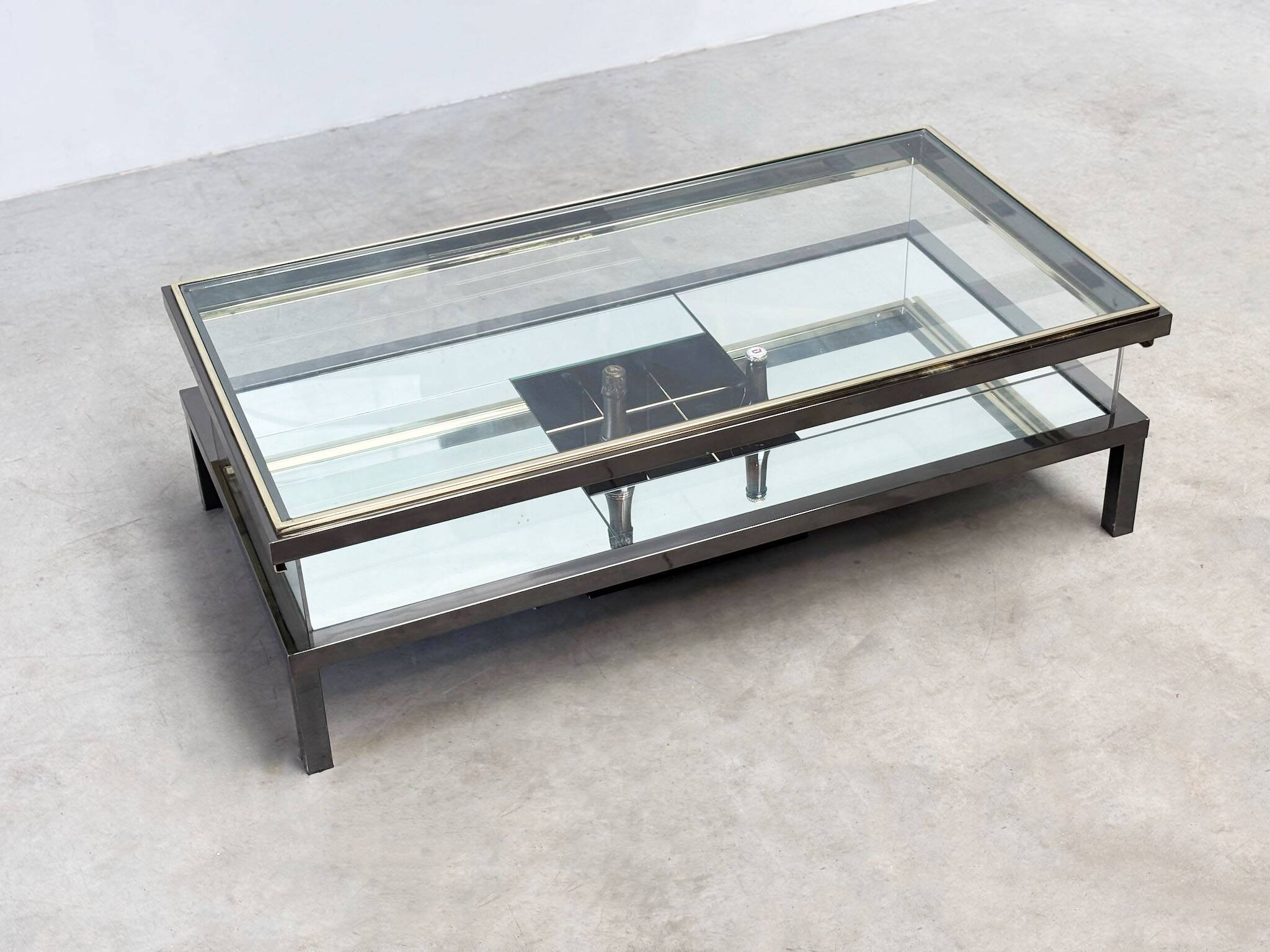 Rare Maison Jansen (attr.) sliding coffee table with bottle holder