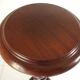 Saddle or walnut pedestal turned in twist