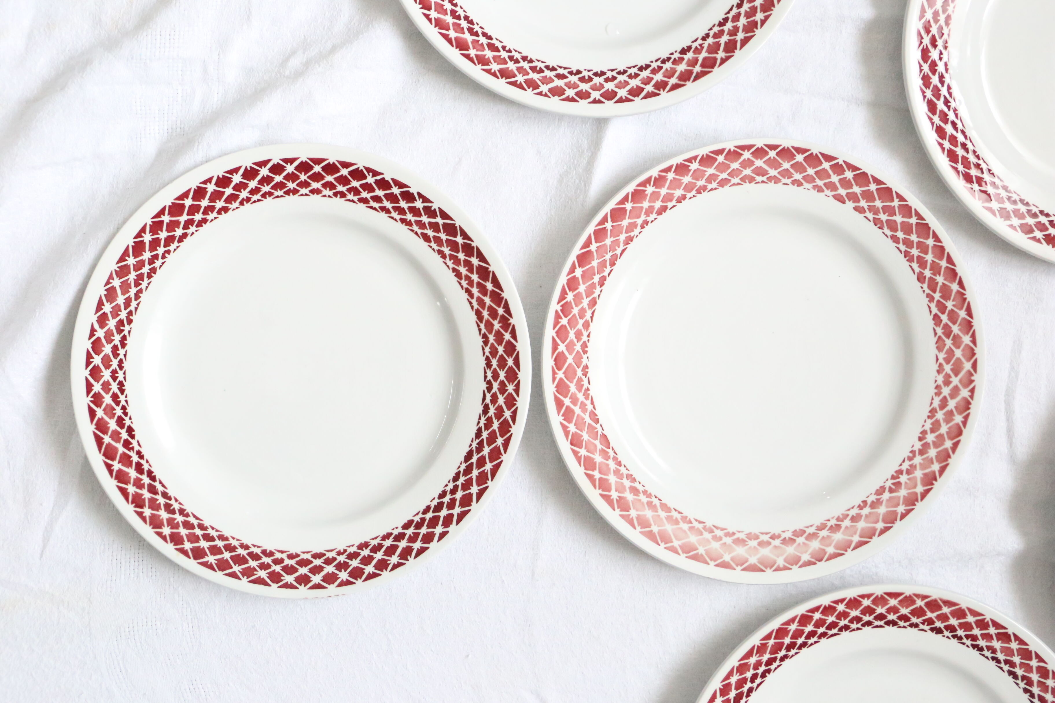 Set of 9 flat plates, geometric patterns, vintage