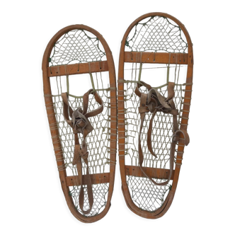 Old snowshoes made of wood and hoses
