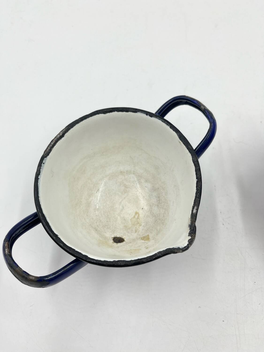 Enamelled metal fondue pot duo