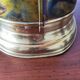 Flame-patterned golden umbrella stand