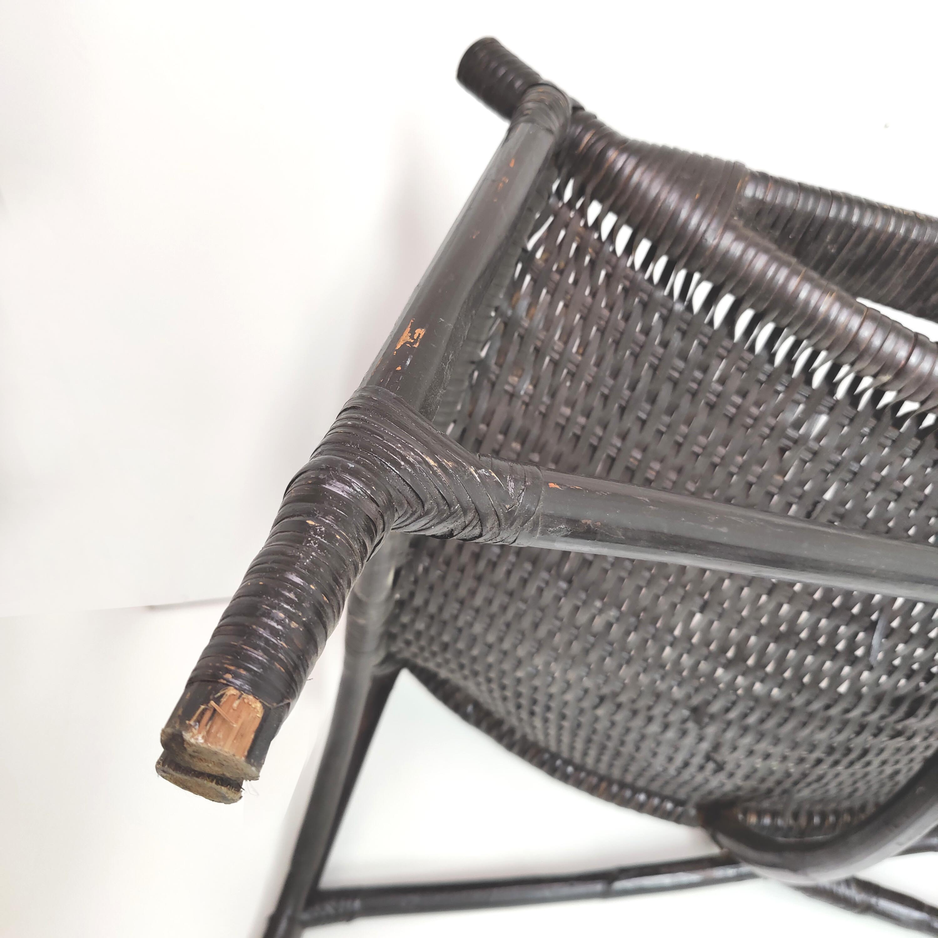 Vintage black rattan deck chair