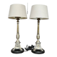 Paire de lampes. Bronze massif argenté.