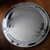 Large old round mirror finely decorated