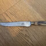 Knife with a forged steel bone handle