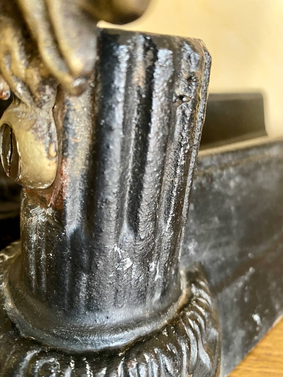 Pair of antique fire dogs with lion heads - patinated cast iron