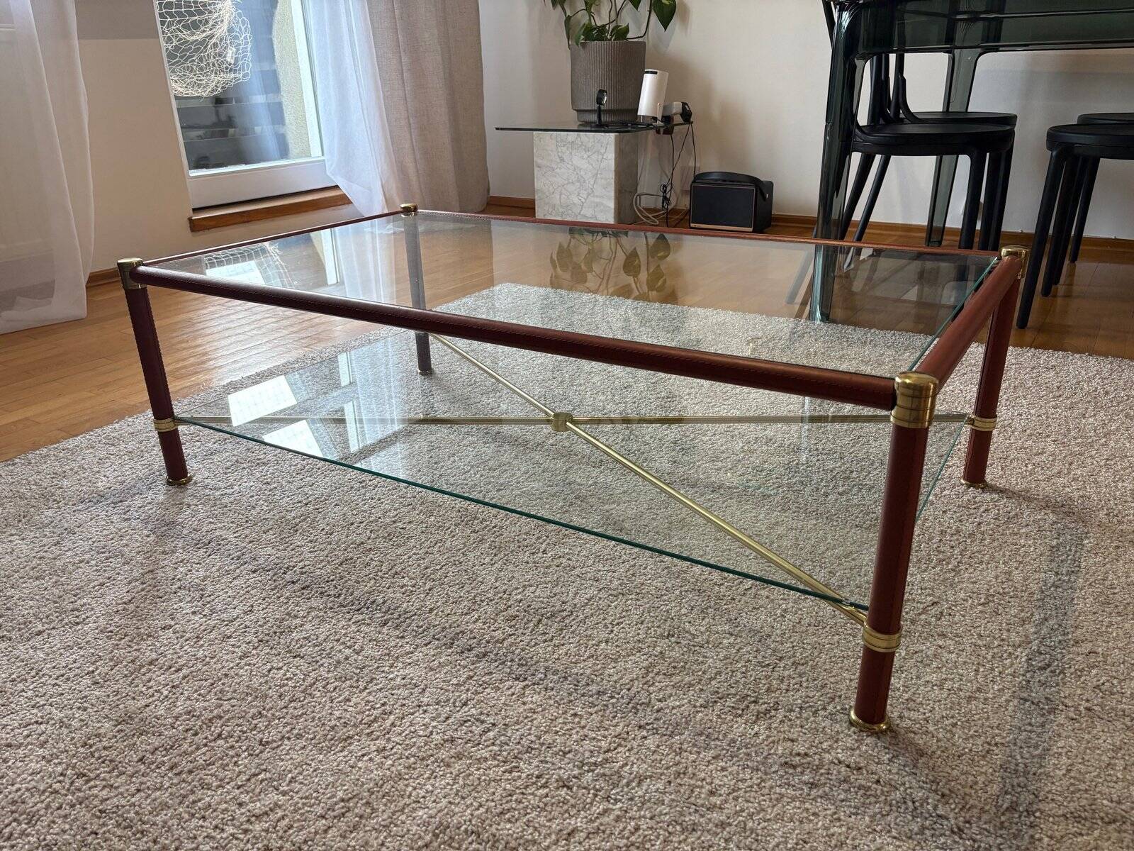 Coffee table in the style of Jacques Adnet, France, 1960s