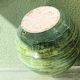 Glazed ceramic ball lamp base, green gradients.