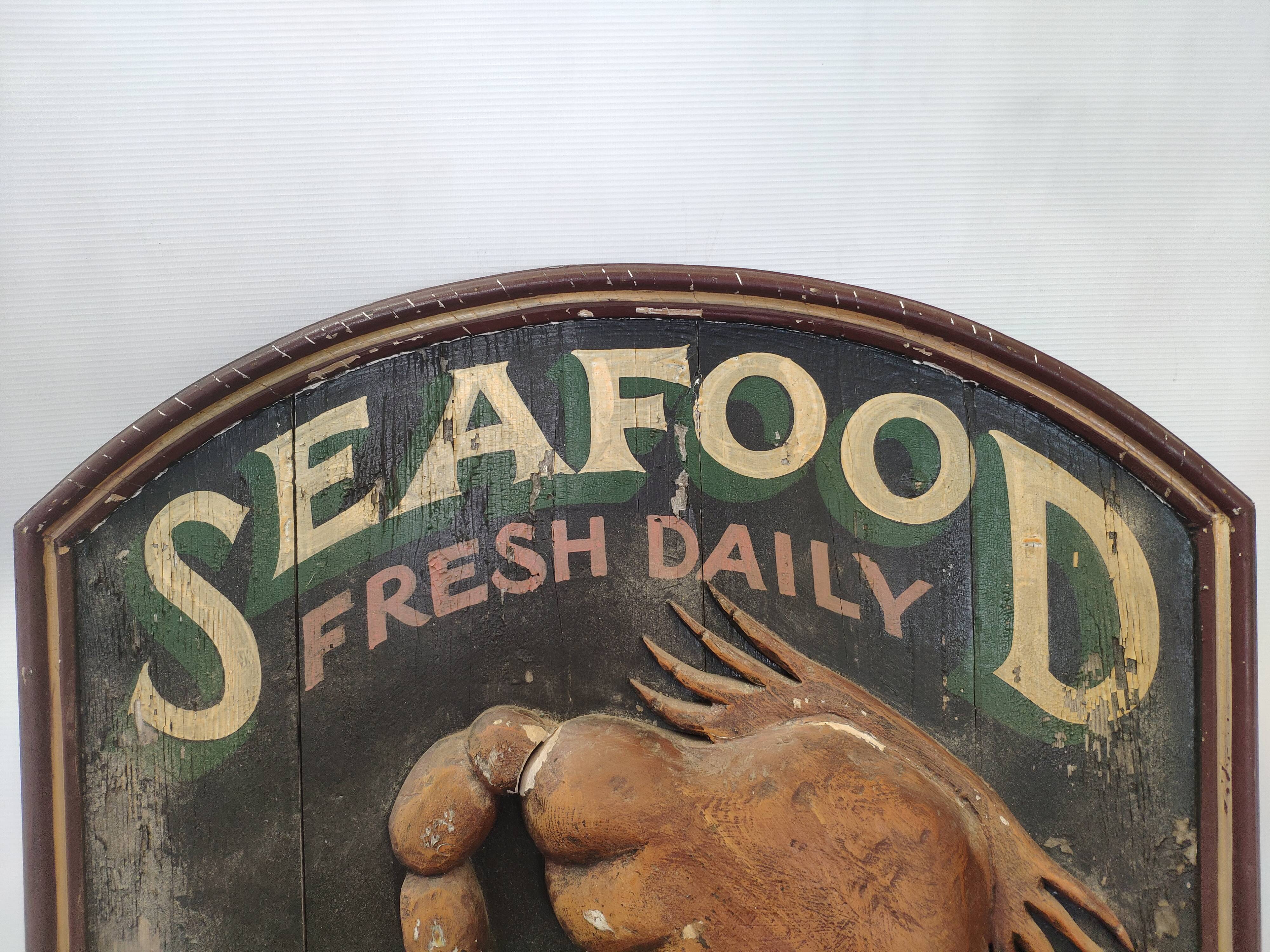 Former Seafood restaurant sign in rare relief