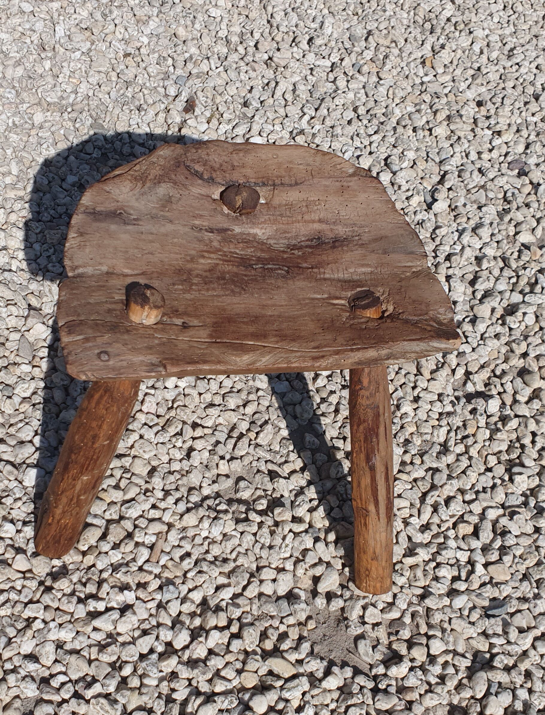 Ancient tripod milking stool