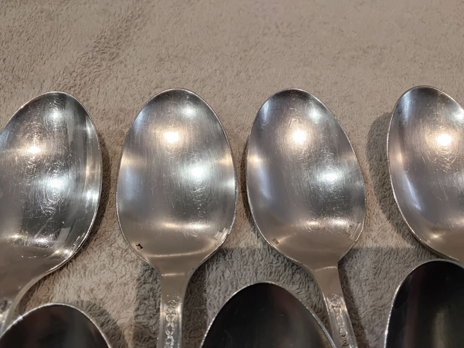 11 silver-plated soup spoons by Christofle Villeroy & Boch, striped