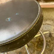 Vintage low swivel stool in chrome steel from the 1970s.