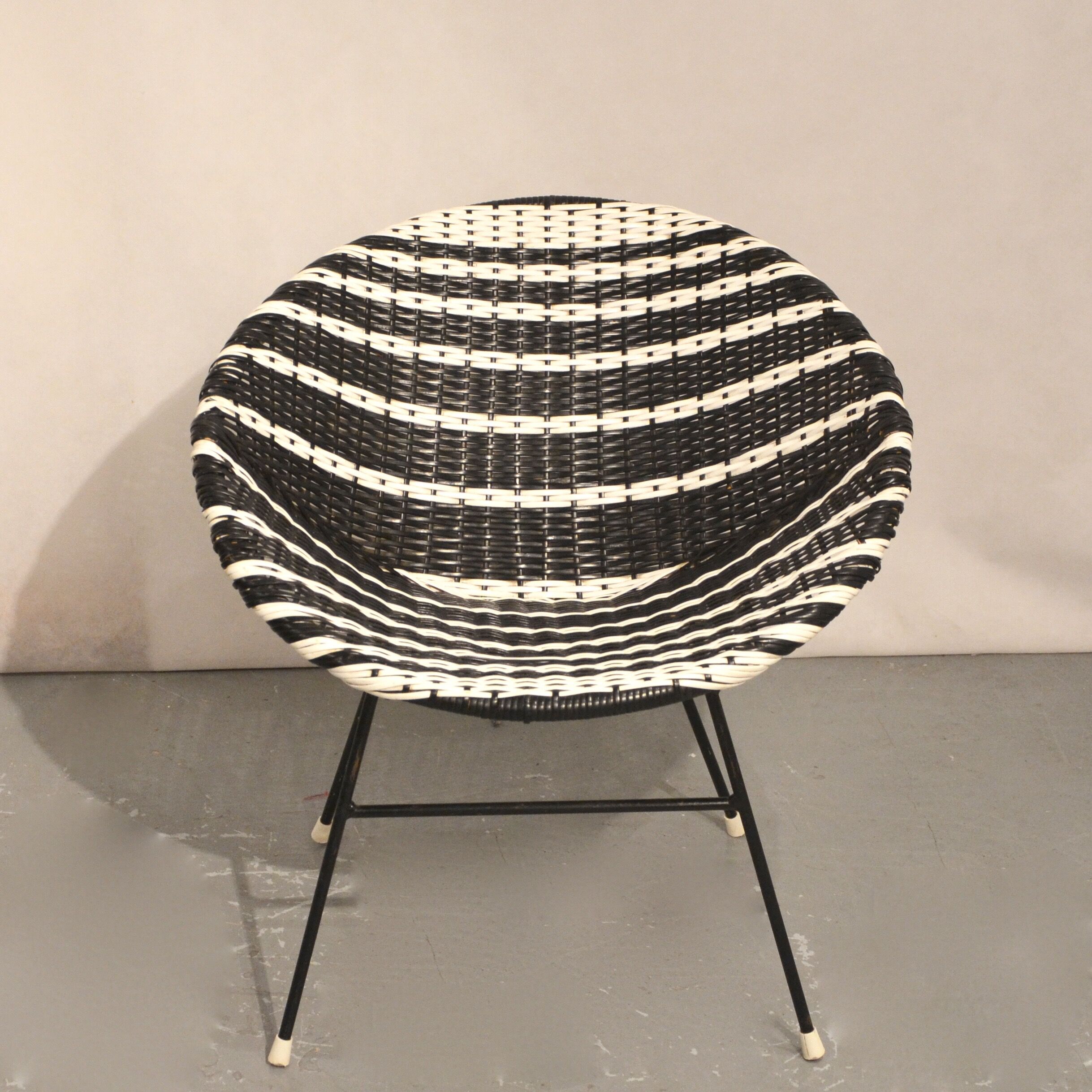 Black and white basket armchair