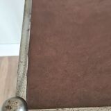 Pedestal table in leather and metal