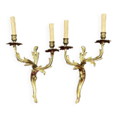 Paire d'appliques en bronze massif doré.