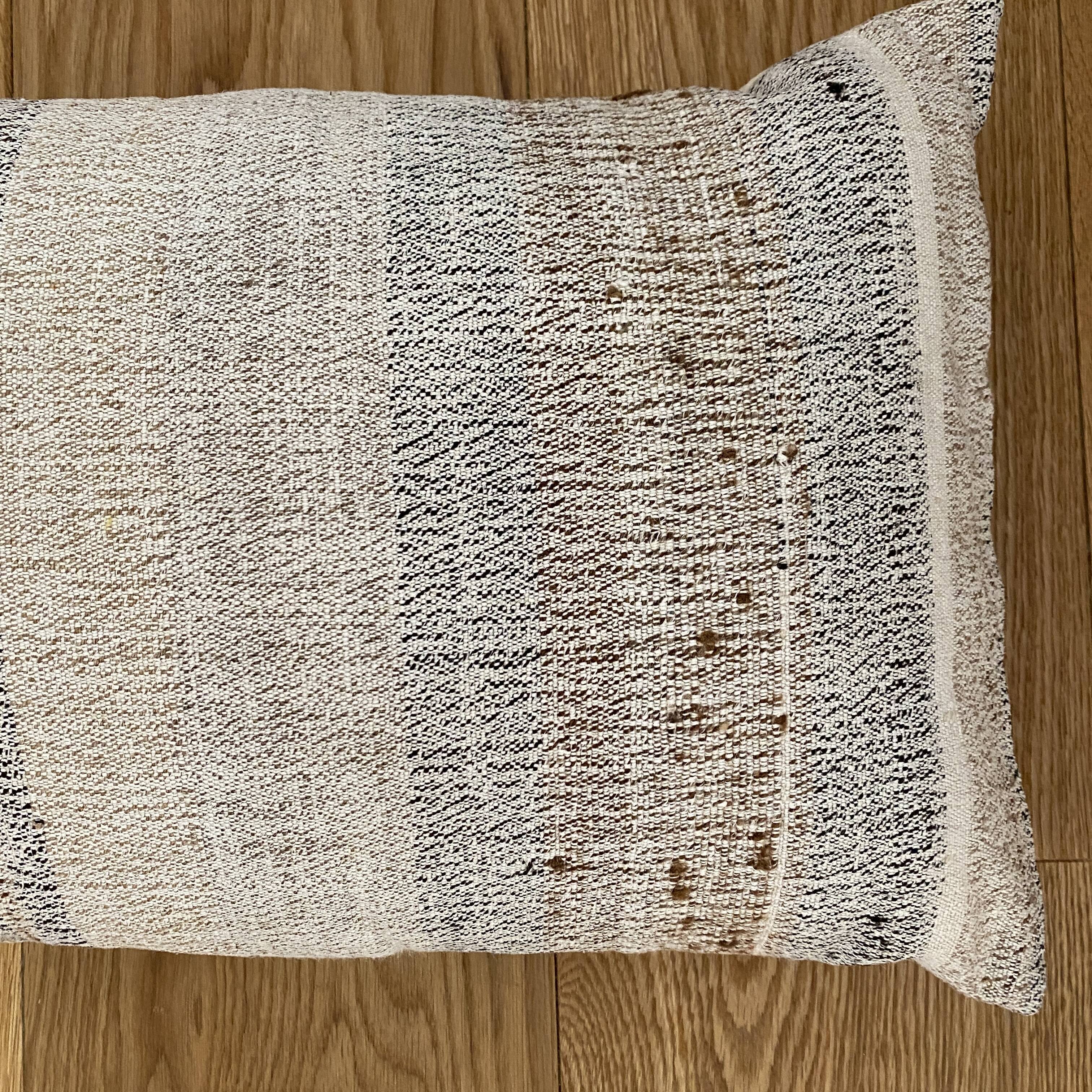 Cushion in vintage woven kilim style, patched.