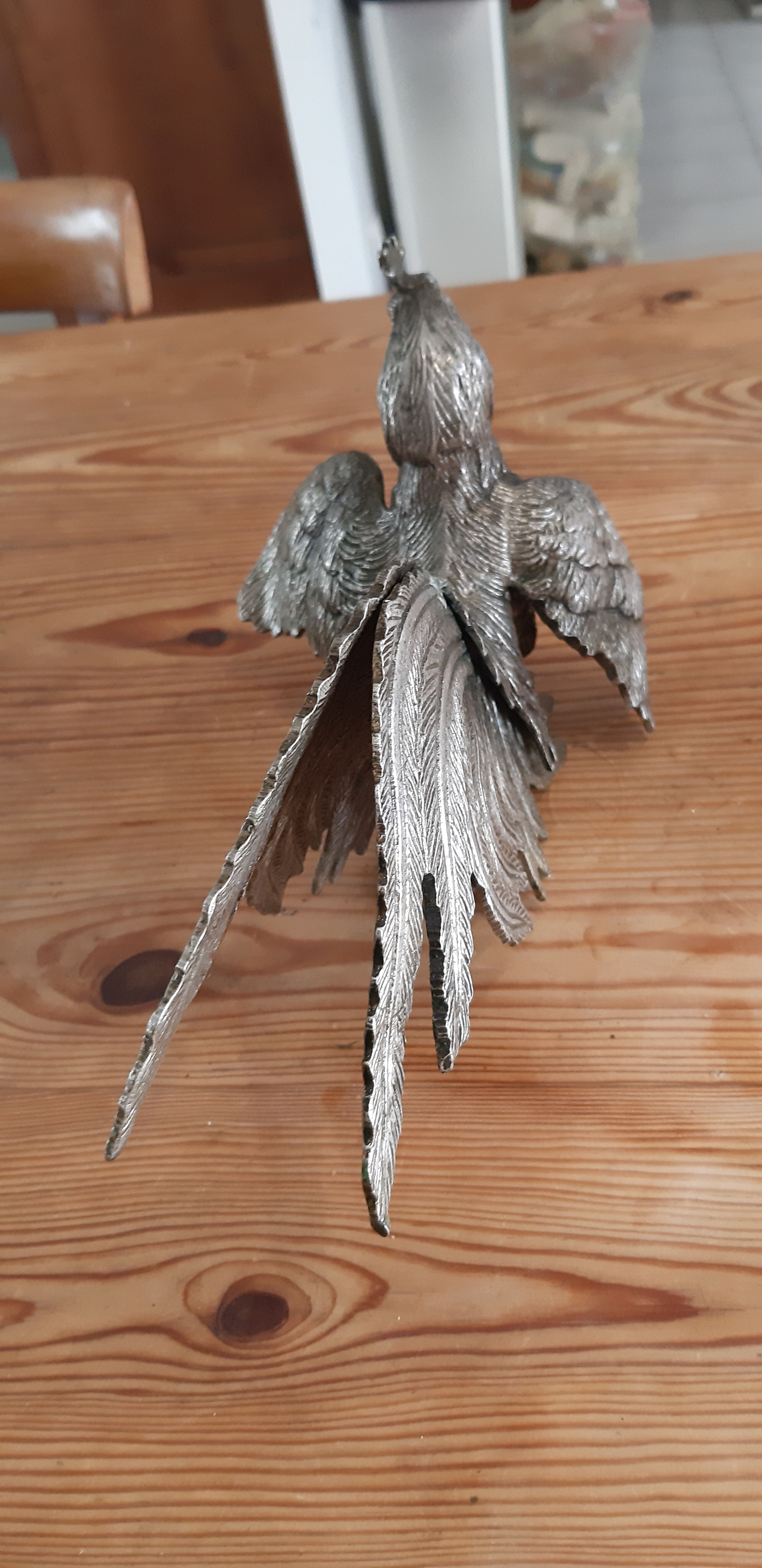 2 silver metal roosters