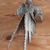 2 silver metal roosters