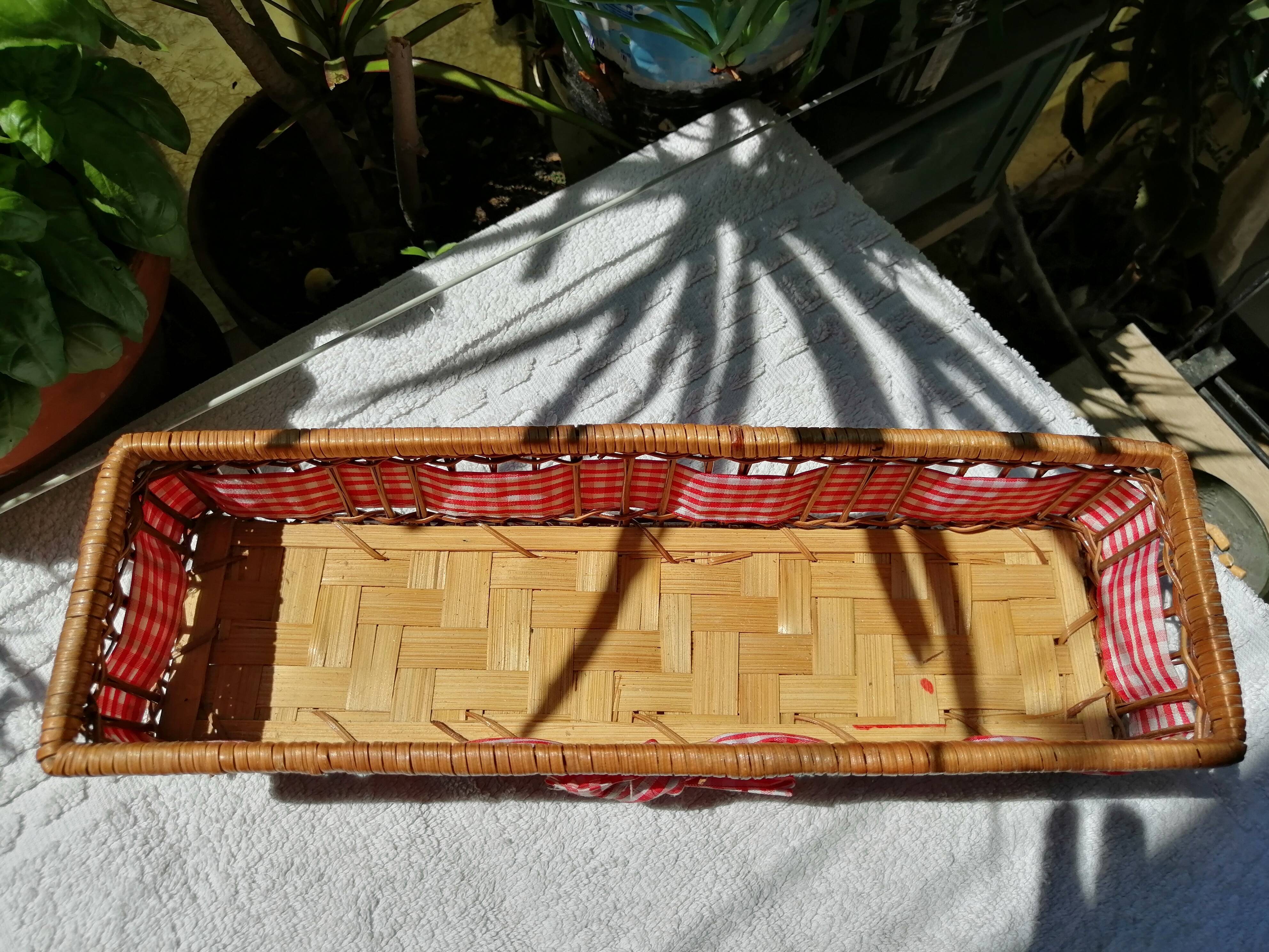 Basket in rattan or Wicker and vintage red gingham fabrics